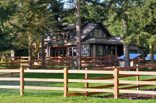 Home seen from fenced pasture