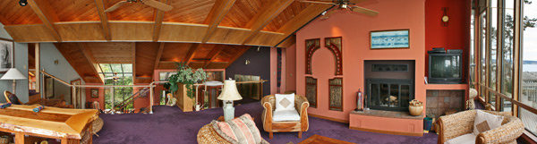 Looking across the upstairs living room toward the entry