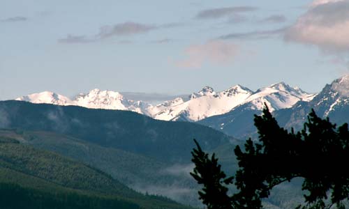 The majestic Olympic Mountains stretch out before you